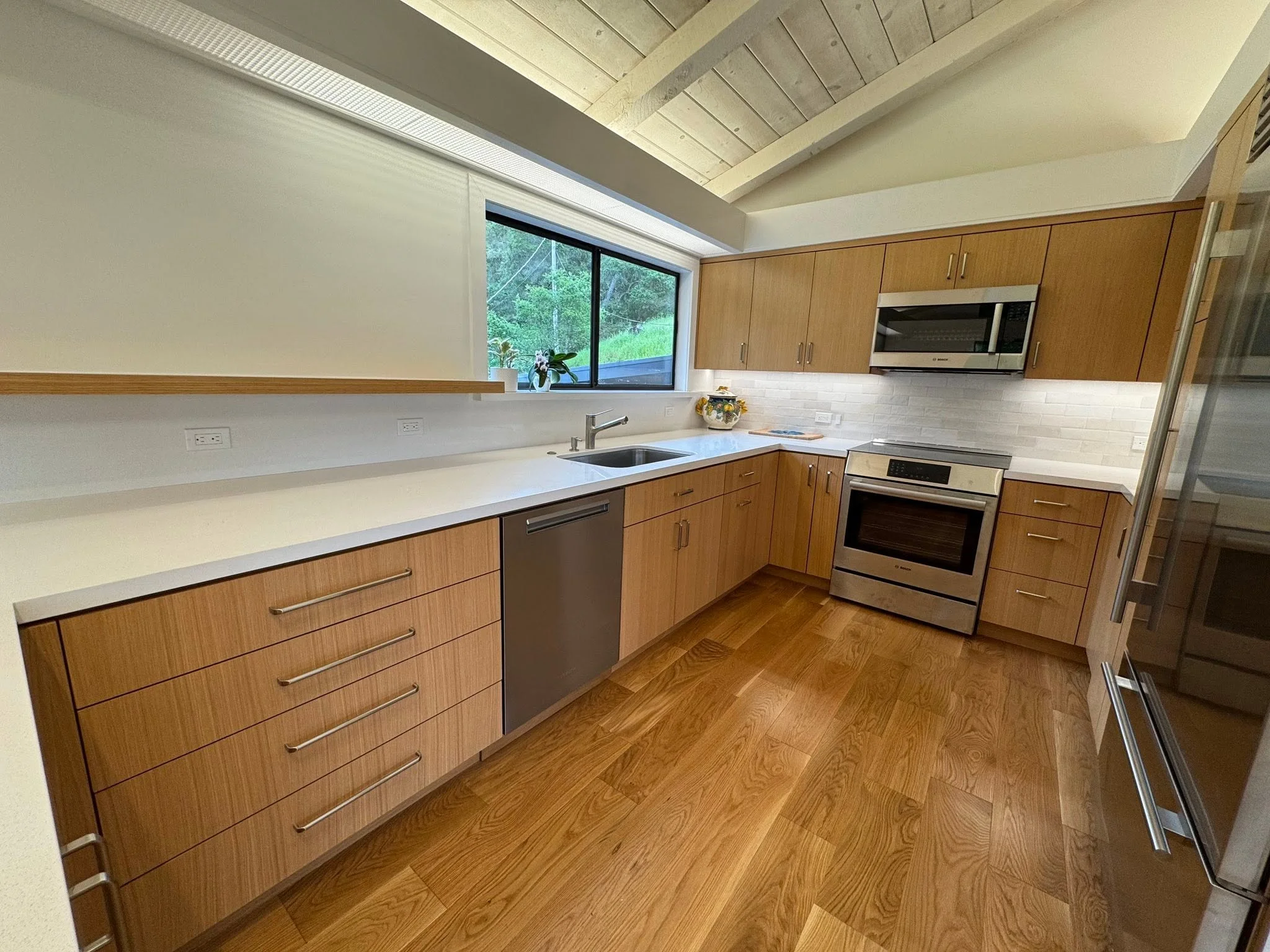 Modern kitchen plumbing remodel with sink and dishwasher